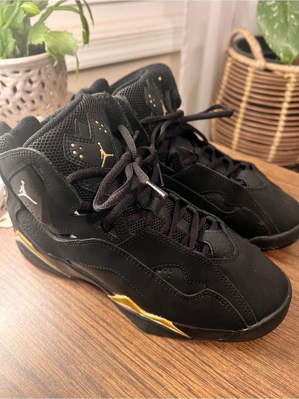 Jordan Black and Gold High Top Sneakers